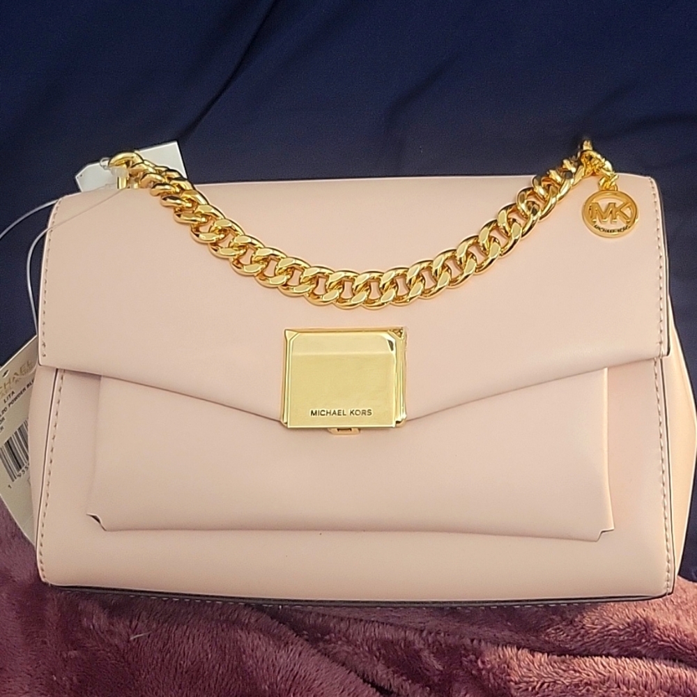 MK handbag and small goods